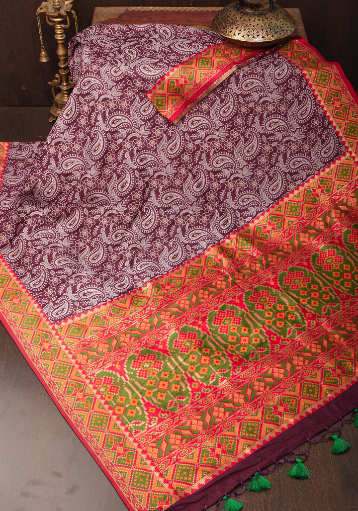 Rayon Saree Paisley woven Motifs in Maroon with Geometric Weave Border and Pallu