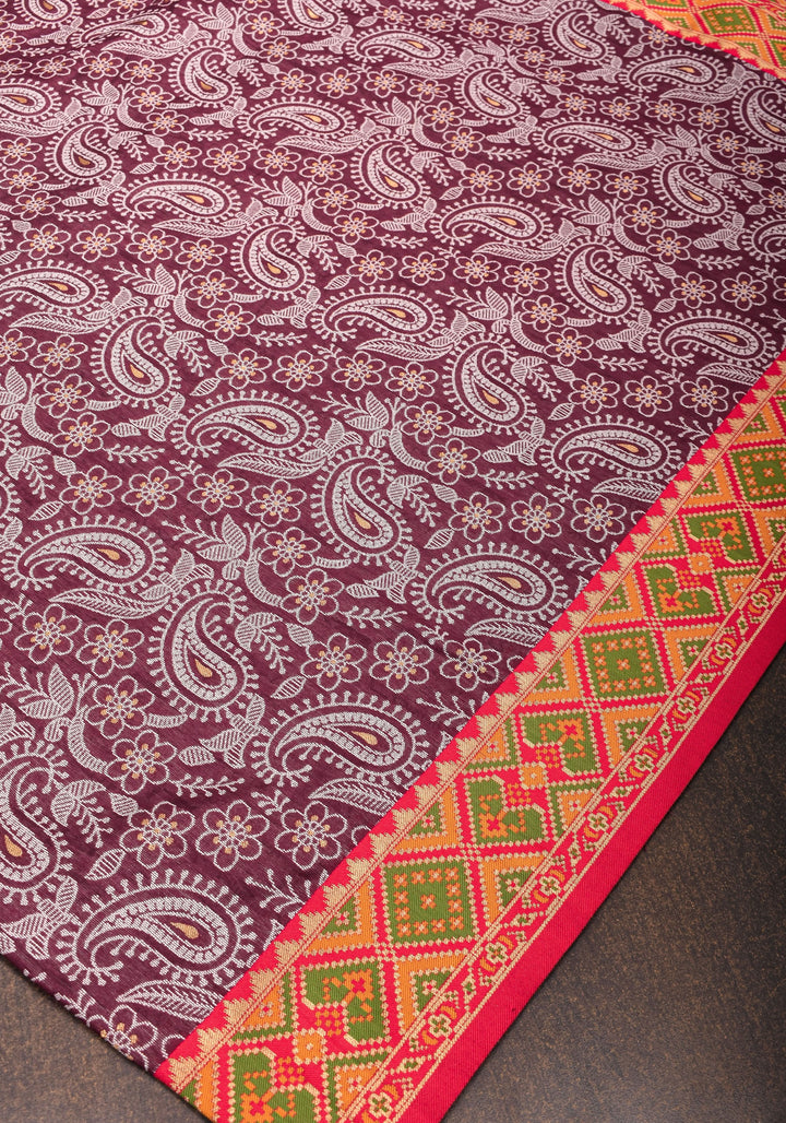 Rayon Saree Paisley woven Motifs in Maroon with Geometric Weave Border and Pallu