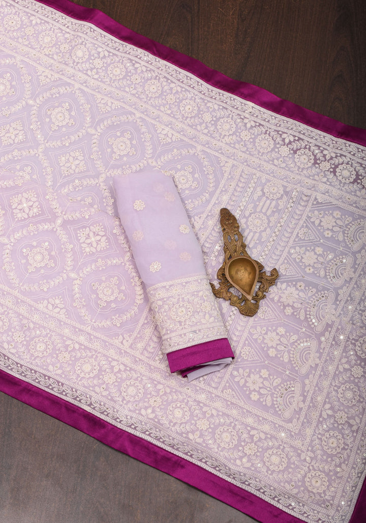 Lilac Georgette Saree with Self Embroidery and Contrasting Satin Trim