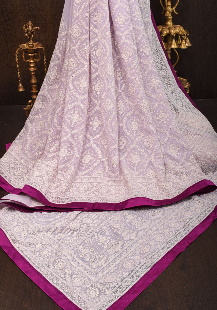 Lilac Georgette Saree with Self Embroidery and Contrasting Satin Trim