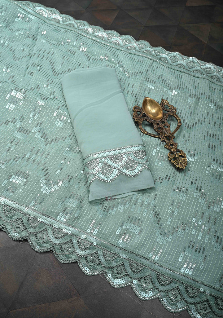 Pale Teal Full Sequins Embellished on Georgette Saree with Scalloped Border