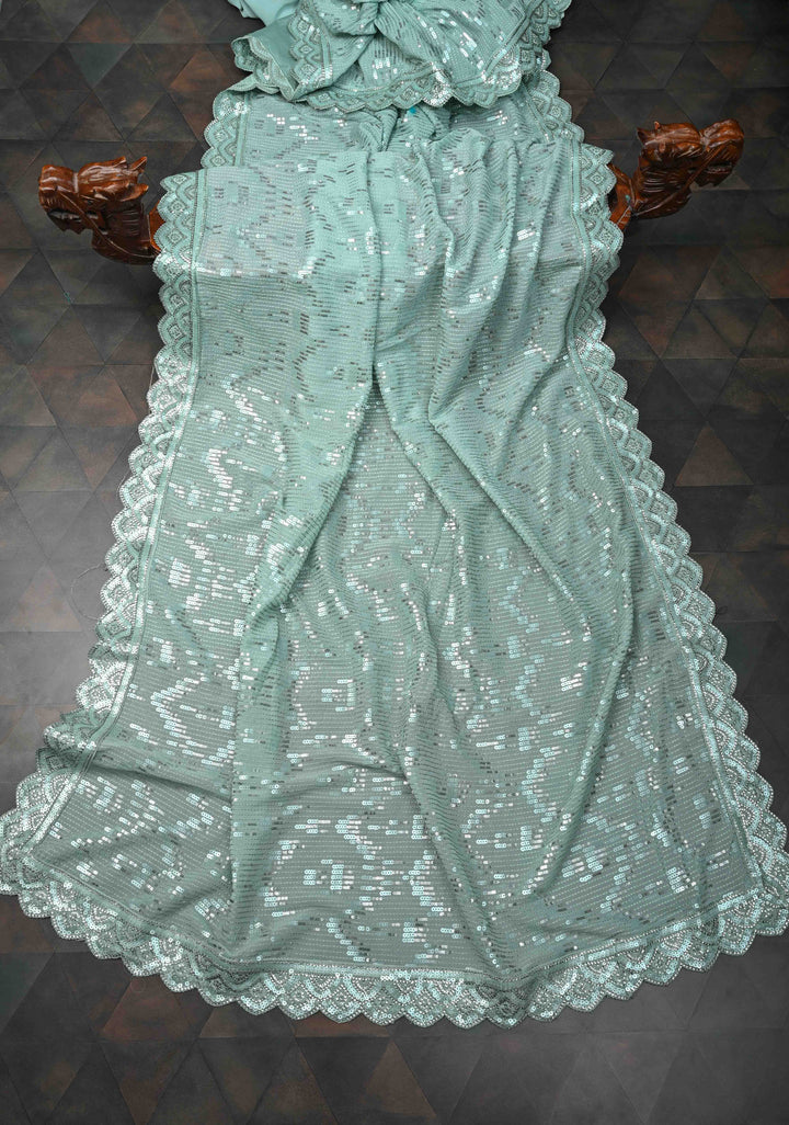 Pale Teal Full Sequins Embellished on Georgette Saree with Scalloped Border