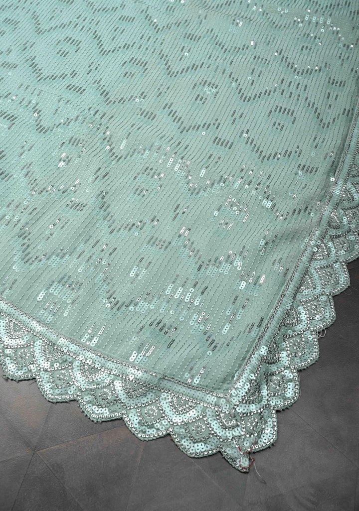 Pale Teal Full Sequins Embellished on Georgette Saree with Scalloped Border