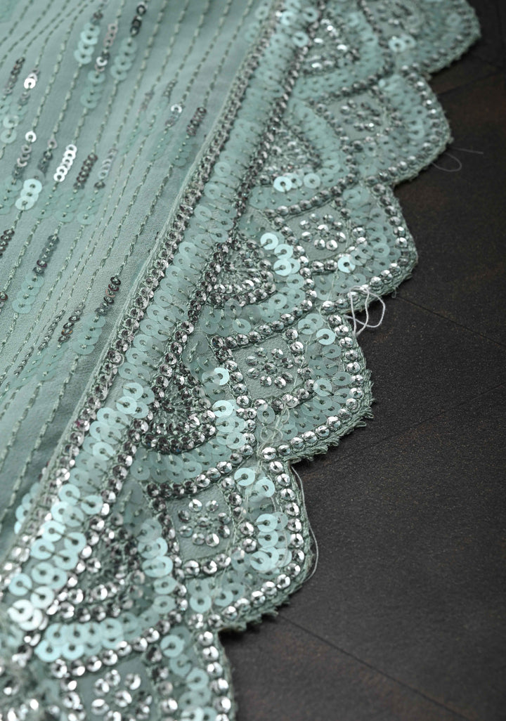 Pale Teal Full Sequins Embellished on Georgette Saree with Scalloped Border