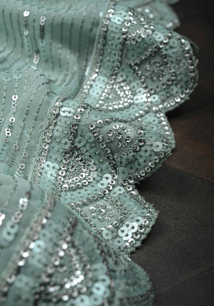 Pale Teal Full Sequins Embellished on Georgette Saree with Scalloped Border