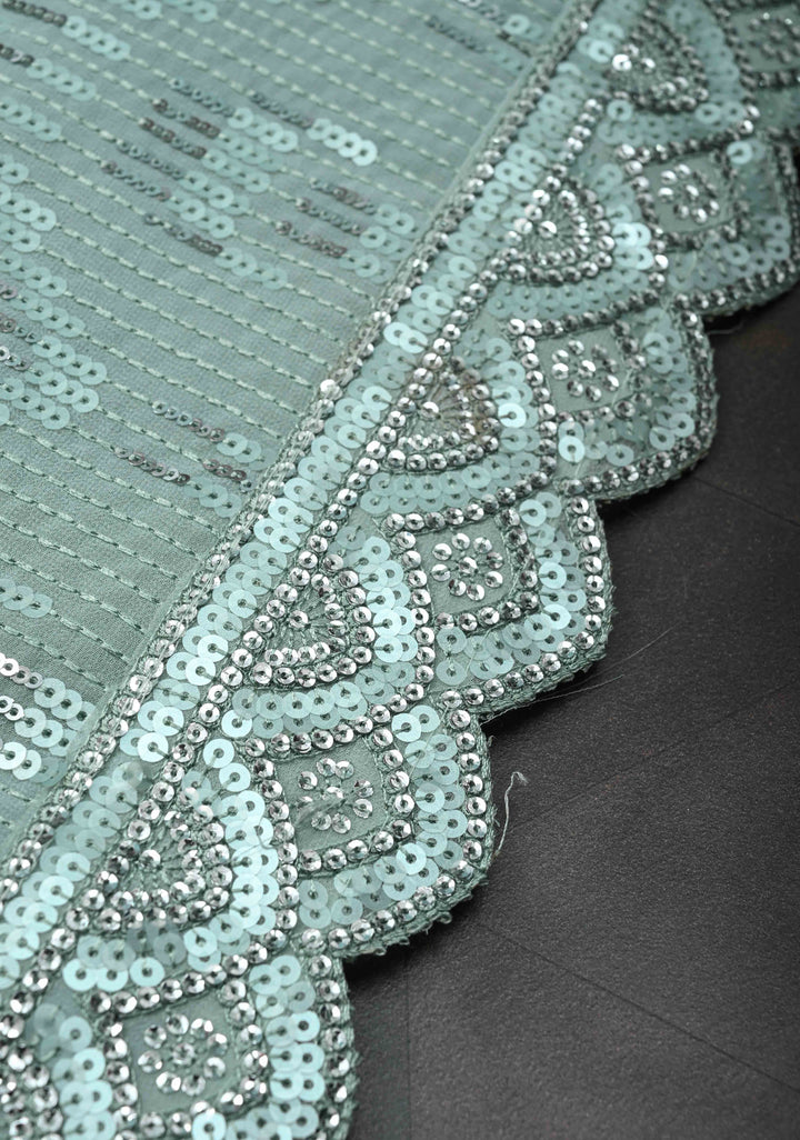 Pale Teal Full Sequins Embellished on Georgette Saree with Scalloped Border