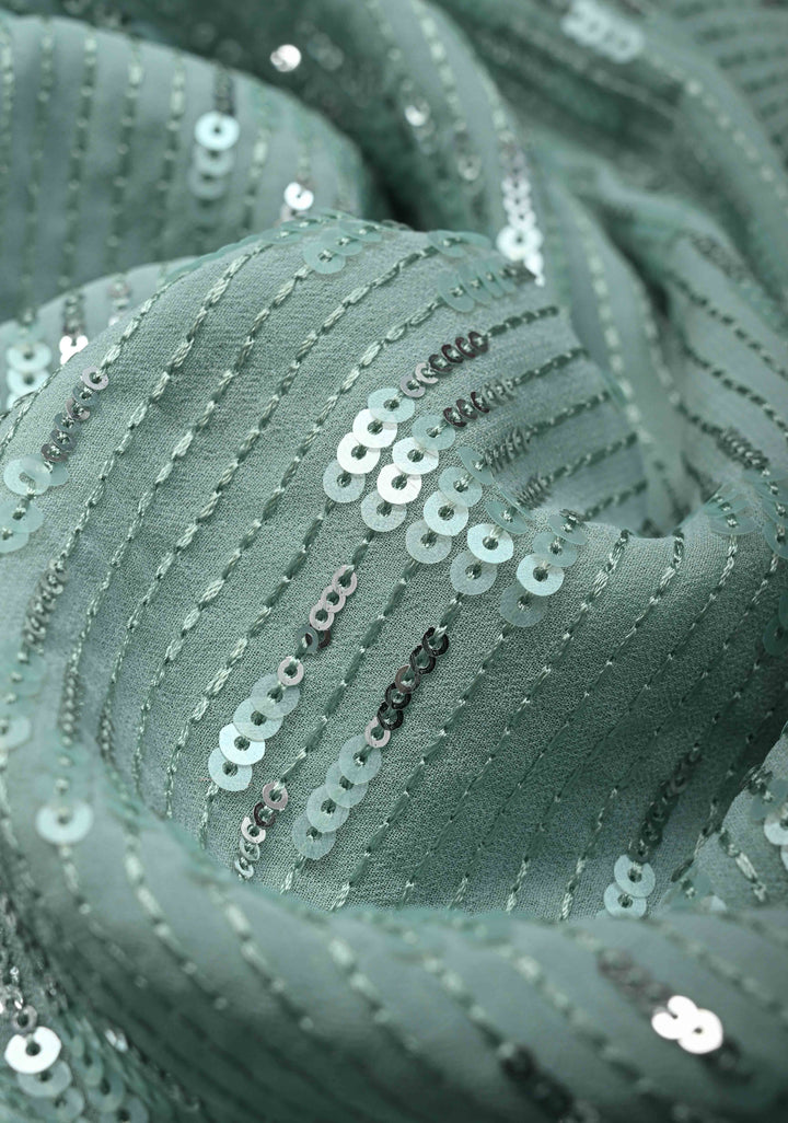 Pale Teal Full Sequins Embellished on Georgette Saree with Scalloped Border