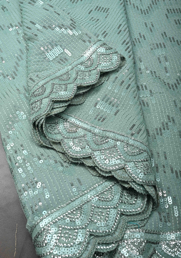 Pale Teal Full Sequins Embellished on Georgette Saree with Scalloped Border
