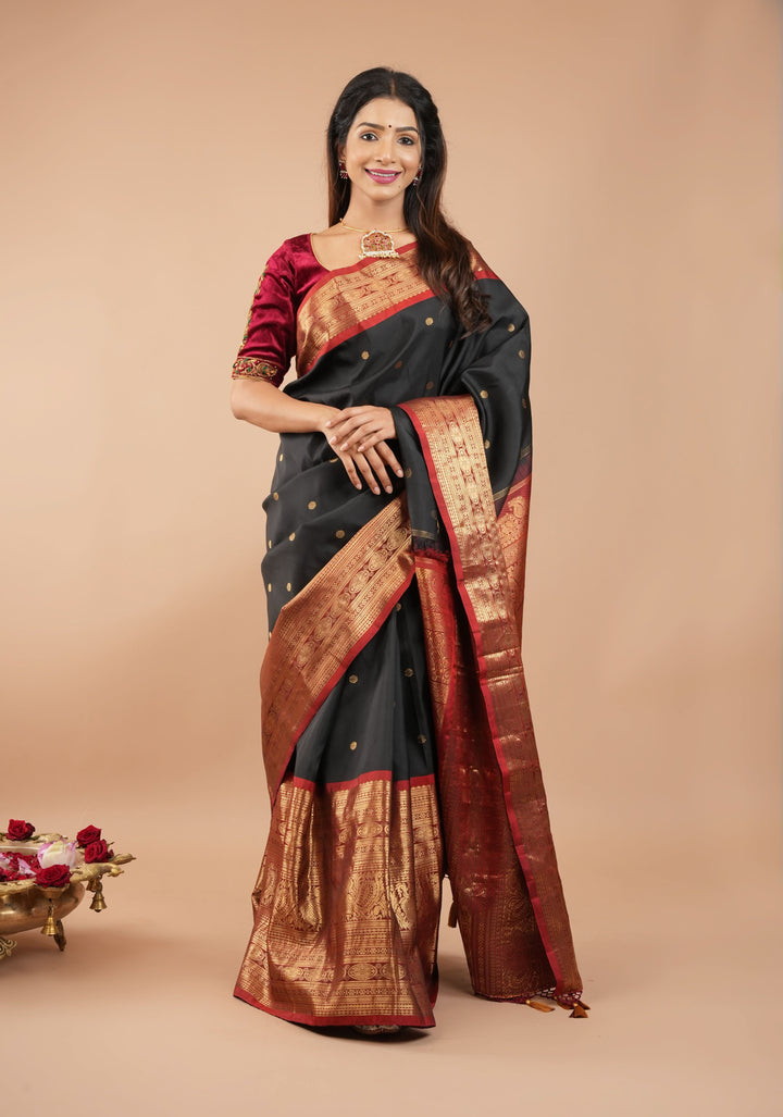 Pure Gadwal Silk Saree in Black color with extravagant 16" wide zari Border | SILK MARK CERTIFIED