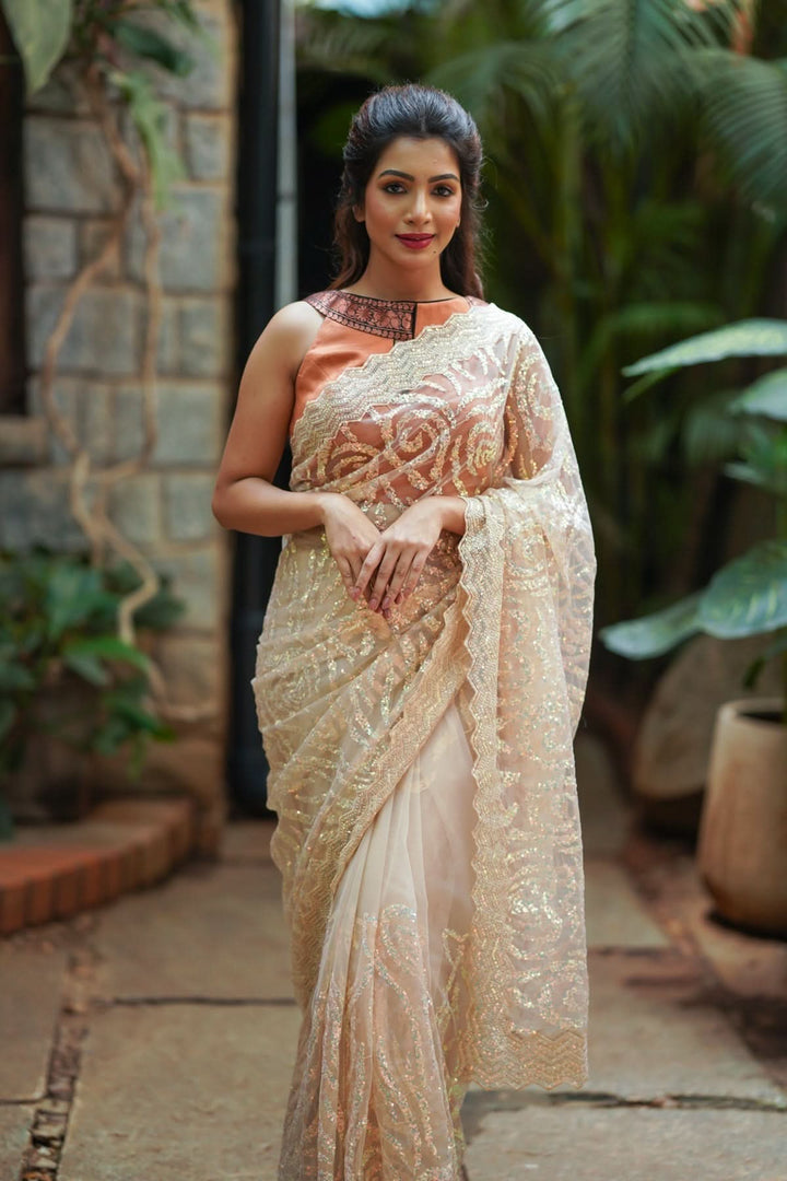 Light Champagne Color Swirl Design Sequins on Net Saree