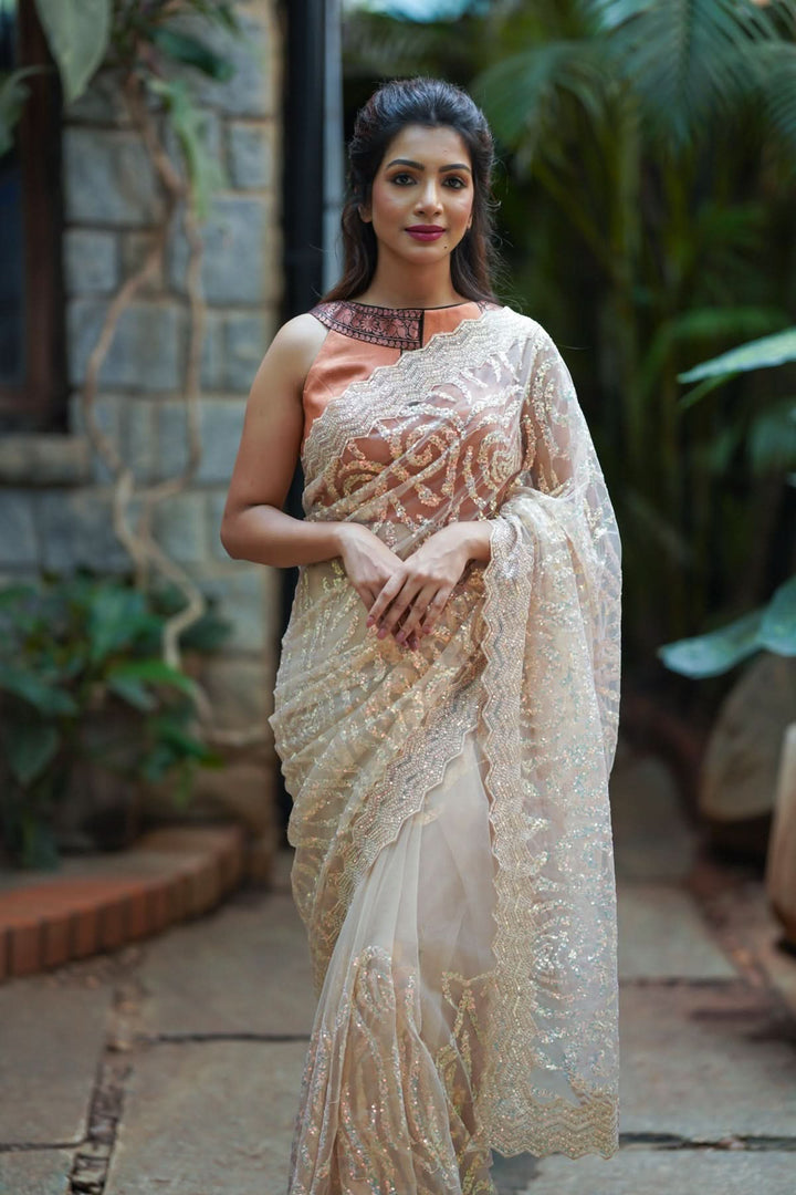 Light Champagne Color Swirl Design Sequins on Net Saree