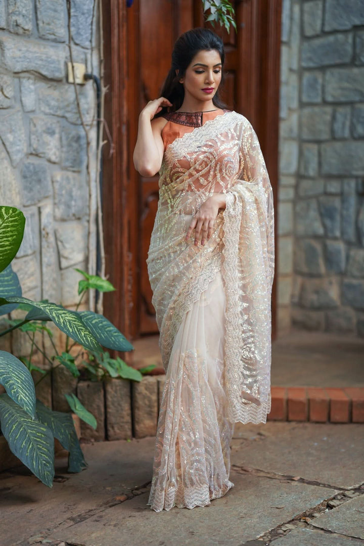 Light Champagne Color Swirl Design Sequins on Net Saree
