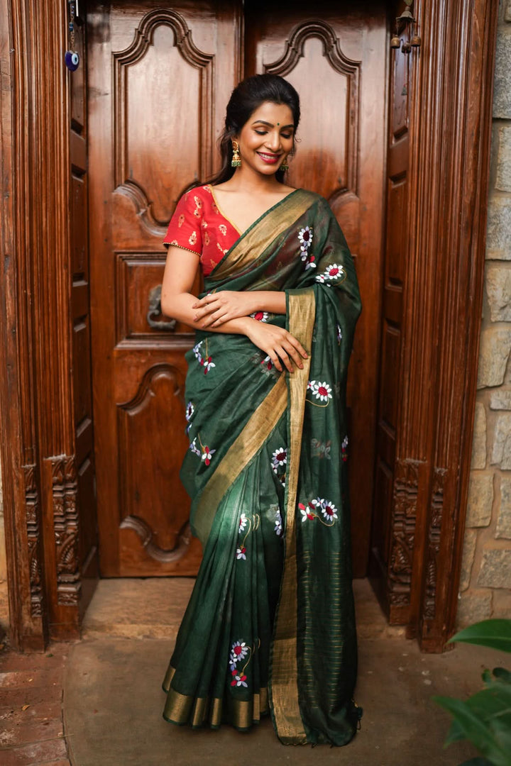 Hunter Green Silk Linen Saree with Moti Nath Embroidery,Woven zari Borders and Long Tassels