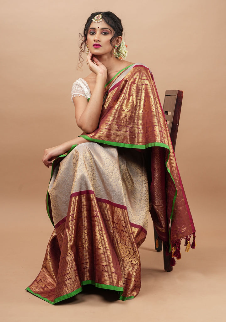 Gray Exquisite Brocade Gadwal Silk Saree with floral Jaal and extravagant 16 inch Zari border | SILK MARK CERTIFIED