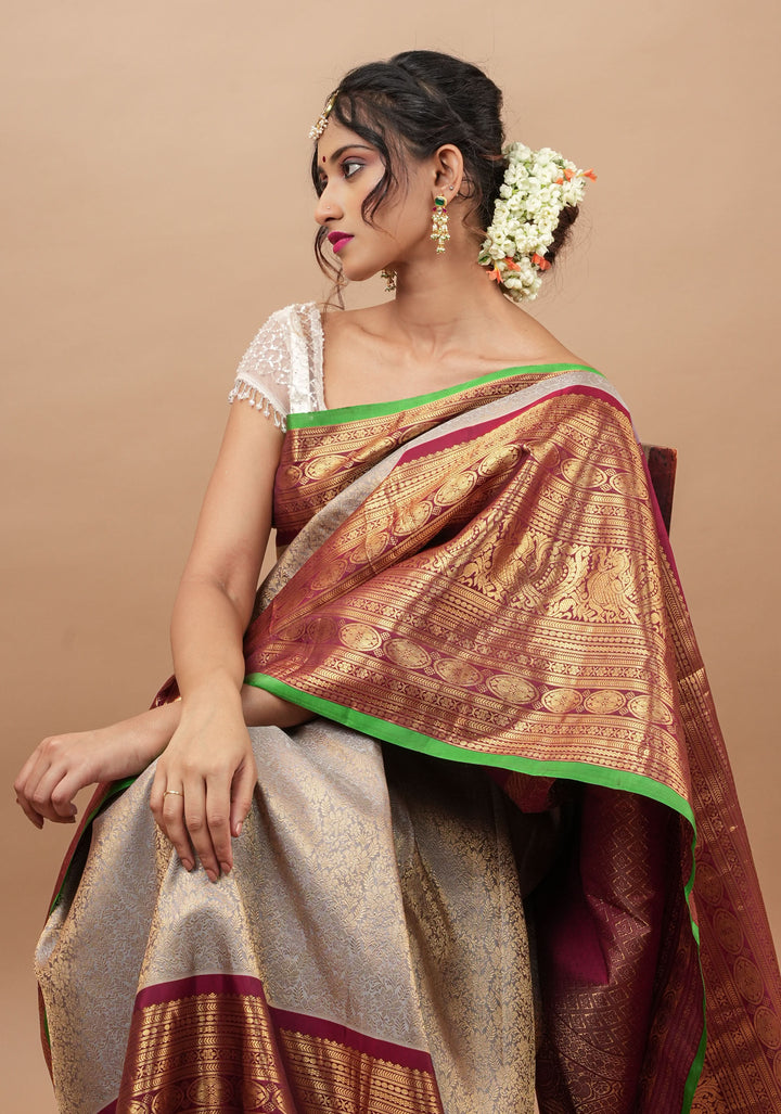 Gray Exquisite Brocade Gadwal Silk Saree with floral Jaal and extravagant 16 inch Zari border | SILK MARK CERTIFIED