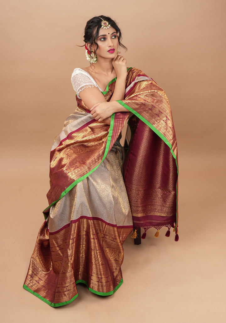 Gray Exquisite Brocade Gadwal Silk Saree with floral Jaal and extravagant 16 inch Zari border | SILK MARK CERTIFIED