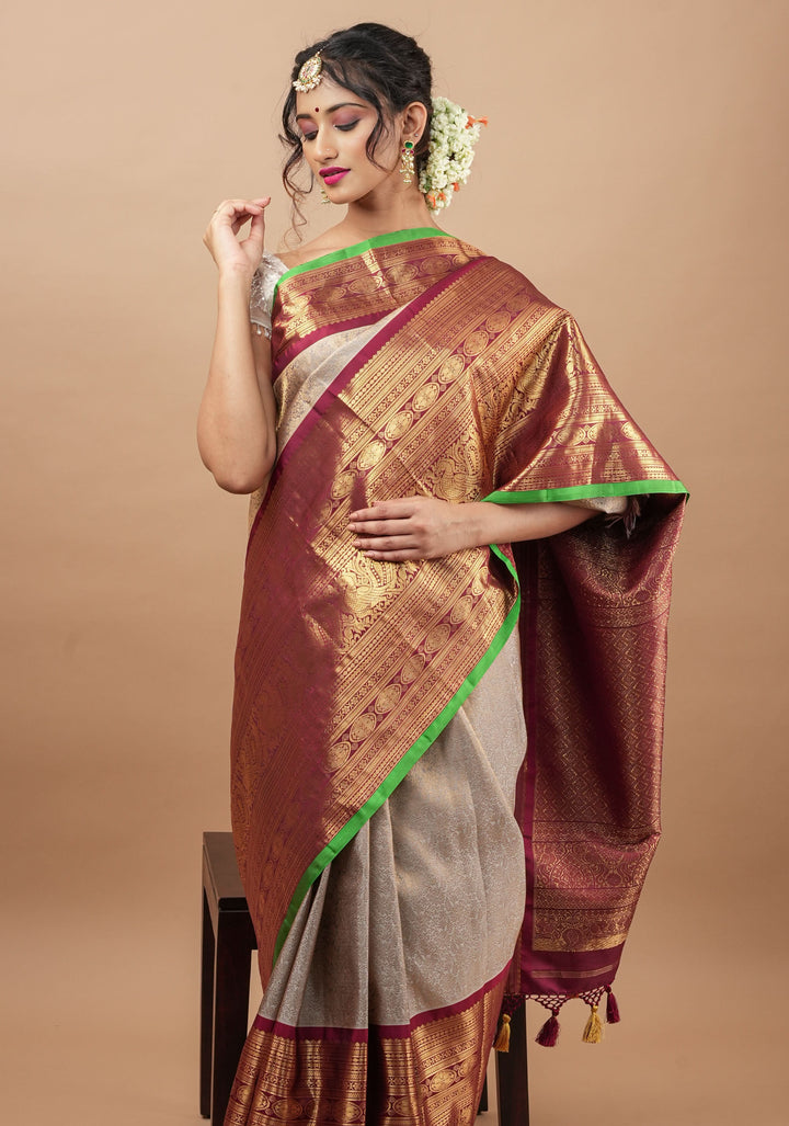 Gray Exquisite Brocade Gadwal Silk Saree with floral Jaal and extravagant 16 inch Zari border | SILK MARK CERTIFIED