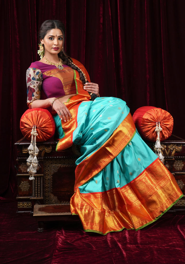 Korvai Cyan Gadwal handwoven pure silk saree with zari buttas and 11"  Red Wide Border | SILK MARK CERTIFIED