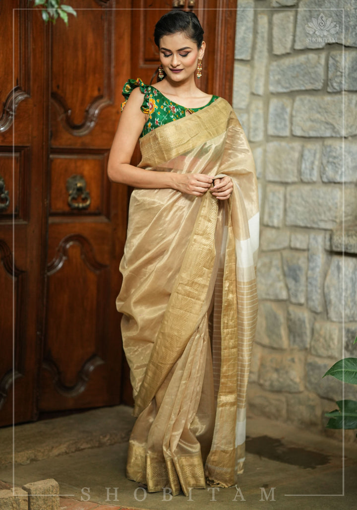 Gorgeous Handwoven Maheshwari Tissue Saree in Gold -Sandalwood with Minimal Zari Borders