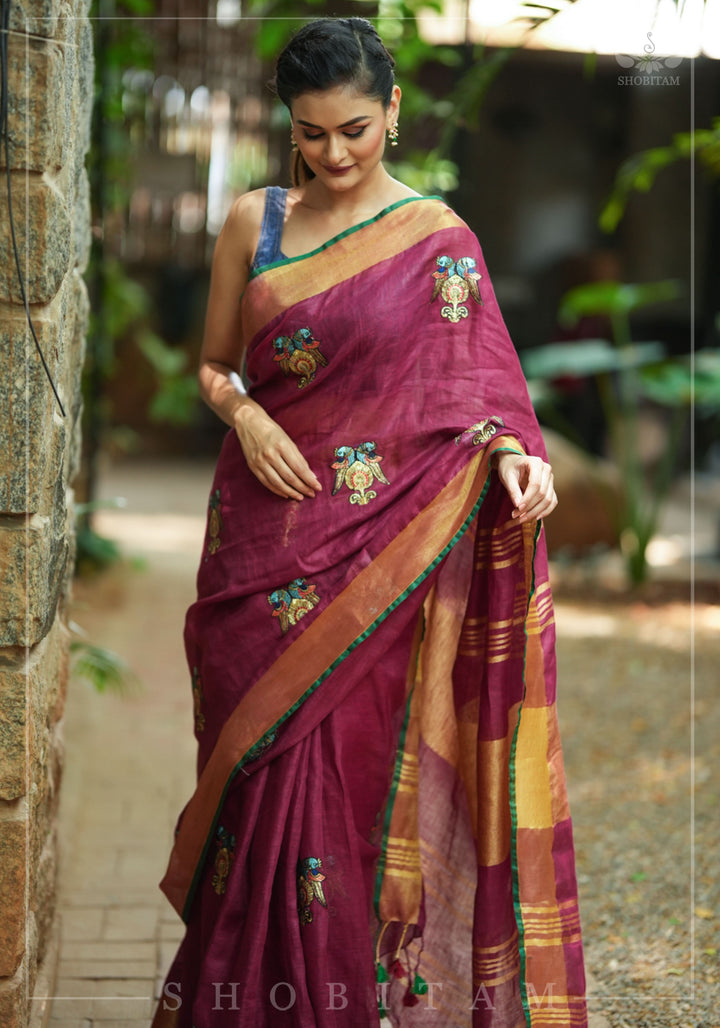 Tanjore Design Twin parrots embroidered motifs on maroon Linen by Linen Saree