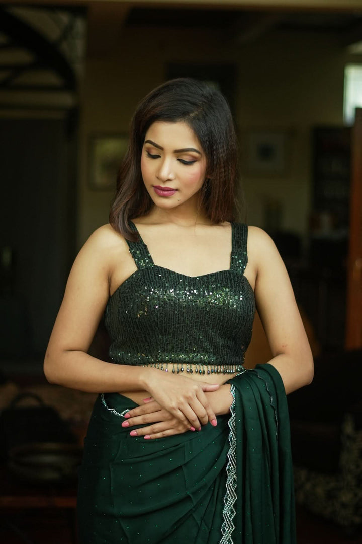 Sequin Sweetheart neck Blouse with crystal beads detailing in Bottle Green