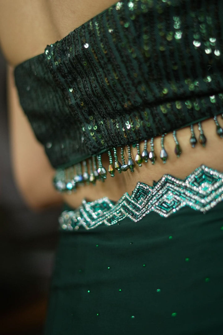 Sequin Sweetheart neck Blouse with crystal beads detailing in Bottle Green