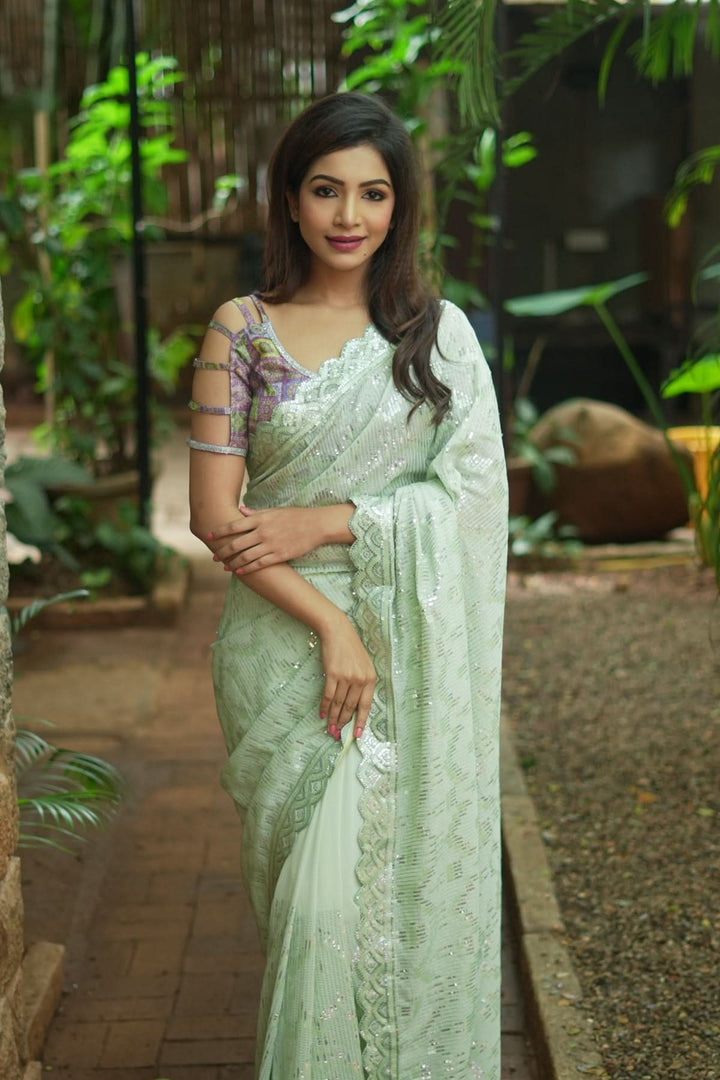 Full Sequins Embellished Georgette Saree in Sage Green with Scalloped border