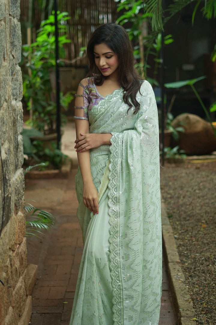 Full Sequins Embellished Georgette Saree in Sage Green with Scalloped border