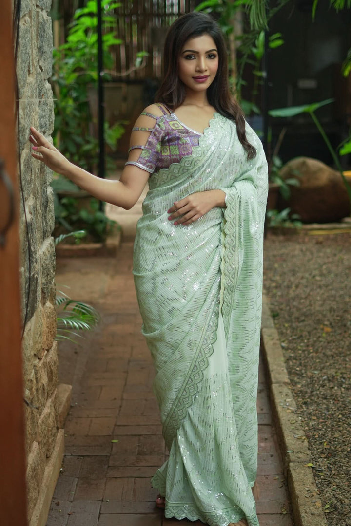 Full Sequins Embellished Georgette Saree in Sage Green with Scalloped border