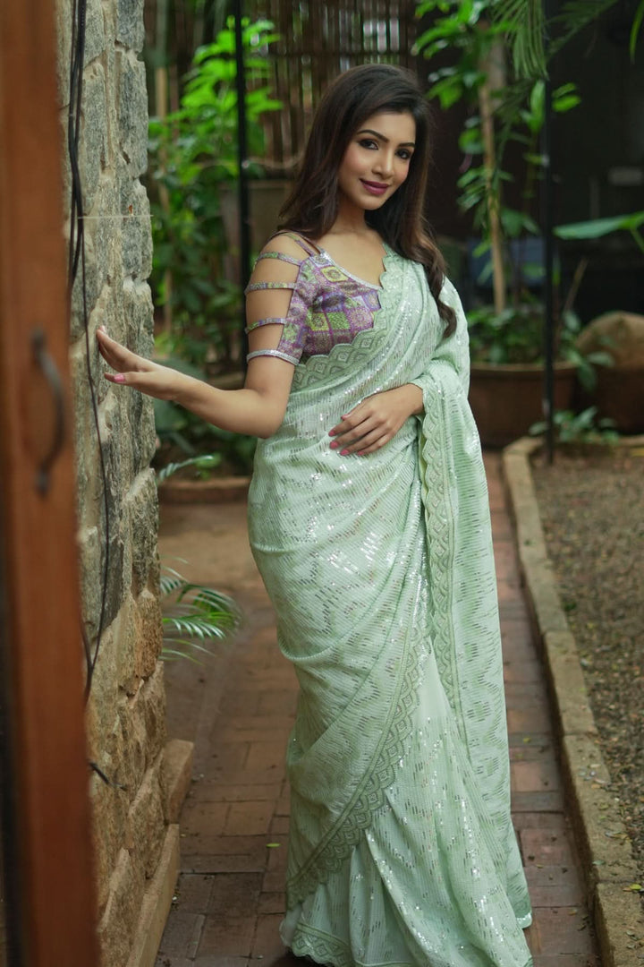 Full Sequins Embellished Georgette Saree in Sage Green with Scalloped border