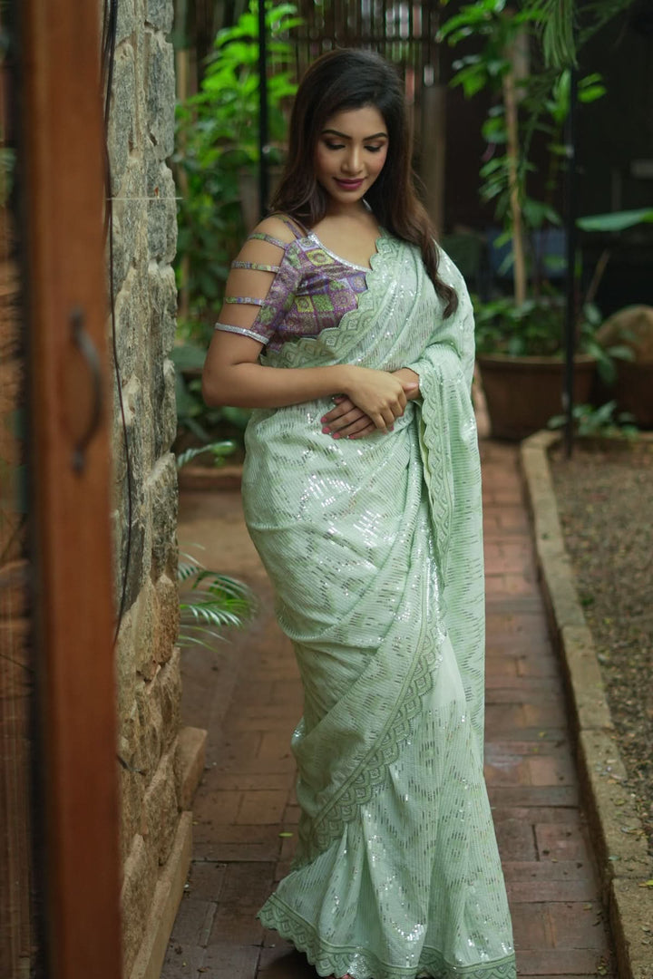 Full Sequins Embellished Georgette Saree in Sage Green with Scalloped border