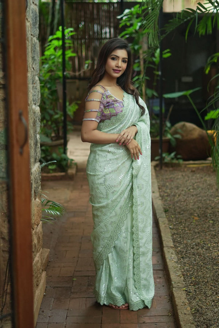 Full Sequins Embellished Georgette Saree in Sage Green with Scalloped border