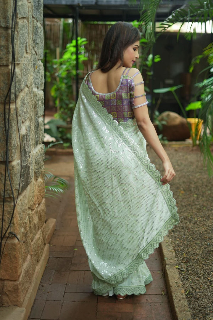 Full Sequins Embellished Georgette Saree in Sage Green with Scalloped border