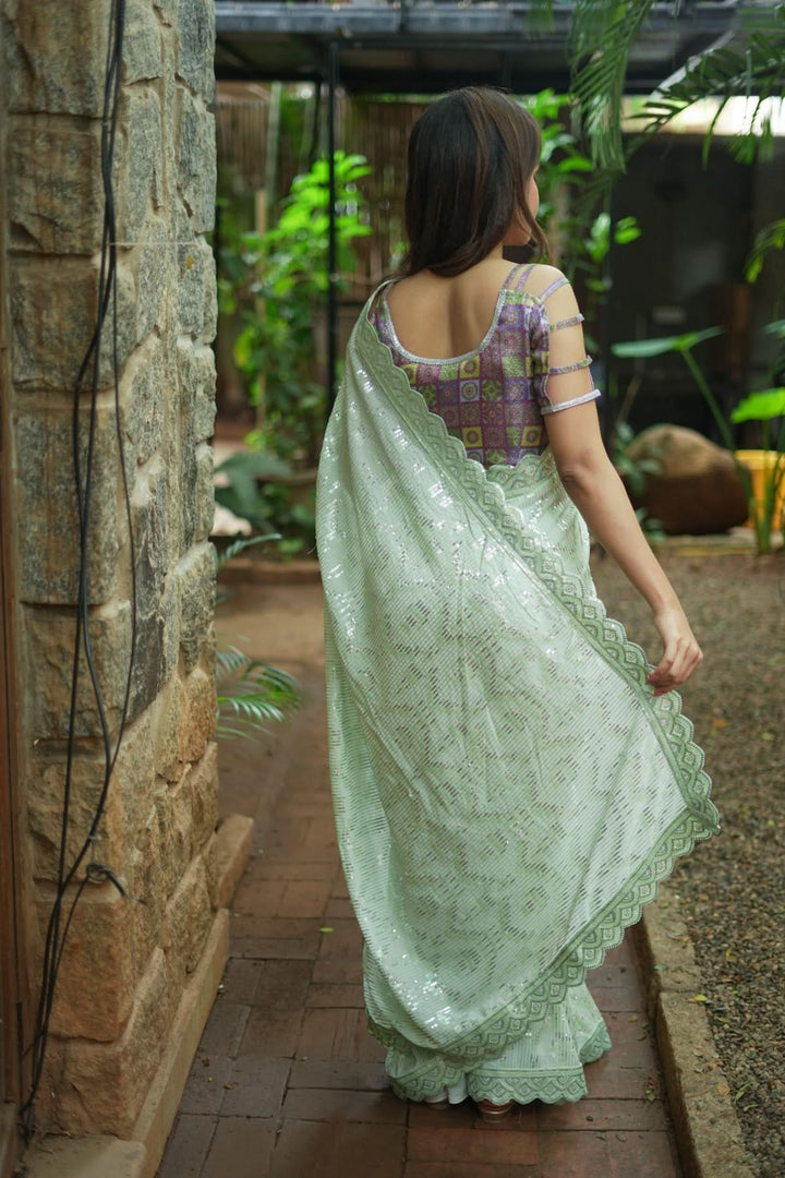 Full Sequins Embellished Georgette Saree in Sage Green with Scalloped border