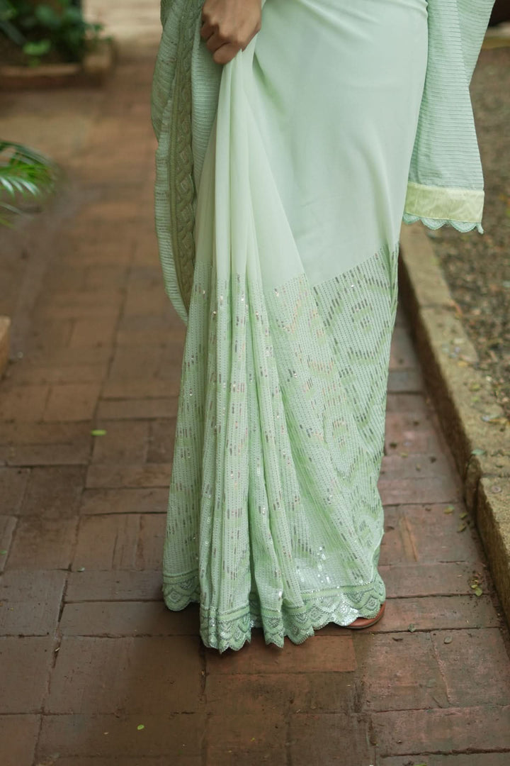 Full Sequins Embellished Georgette Saree in Sage Green with Scalloped border