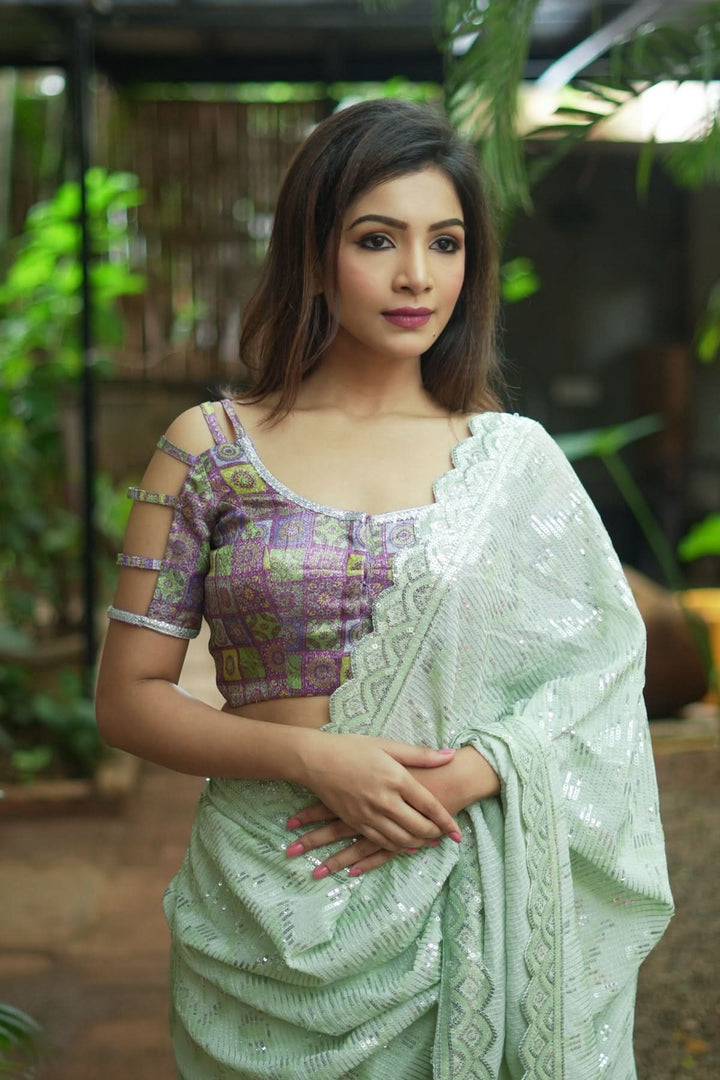 Full Sequins Embellished Georgette Saree in Sage Green with Scalloped border