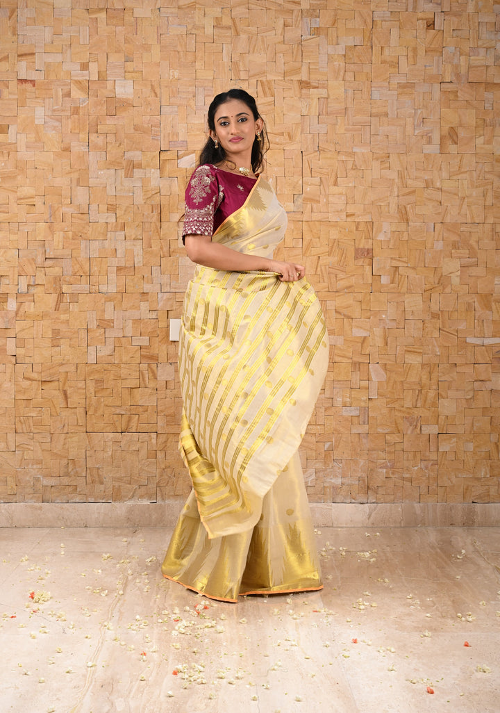 Beige Tissue Cotton Saree with Zari Coin Buttis And Temple Border