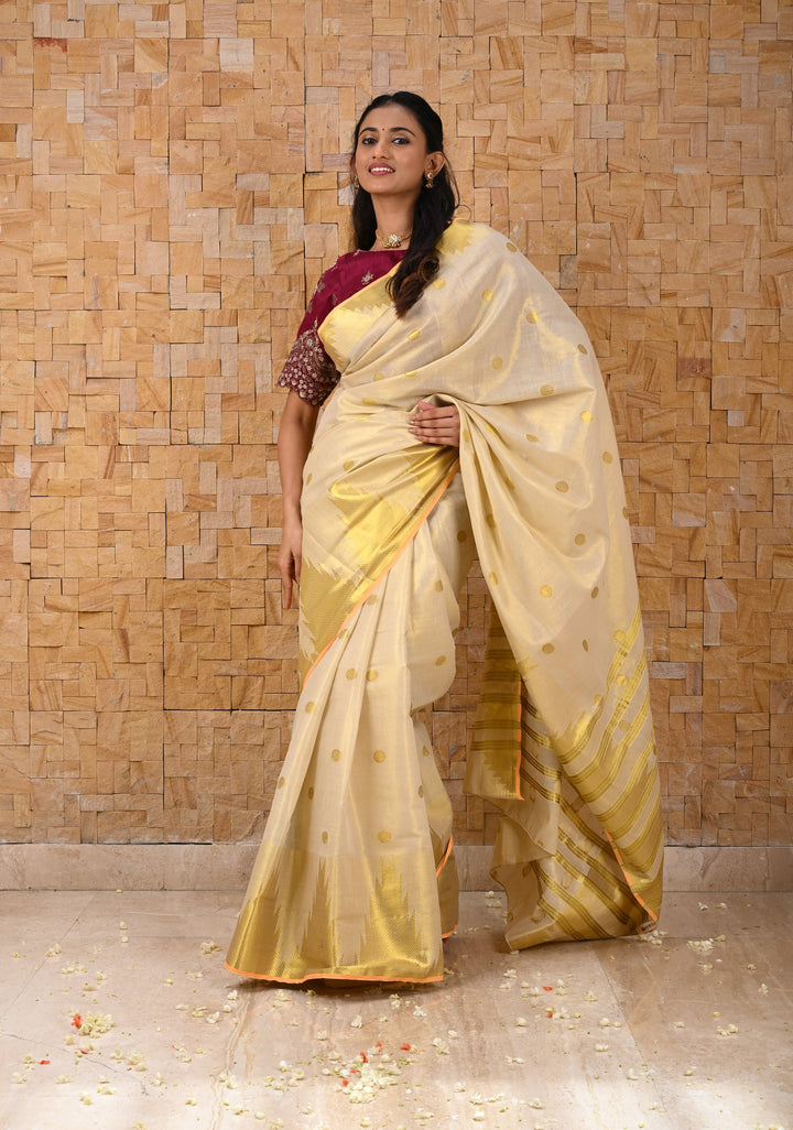 Beige Tissue Cotton Saree with Zari Coin Buttis And Temple Border