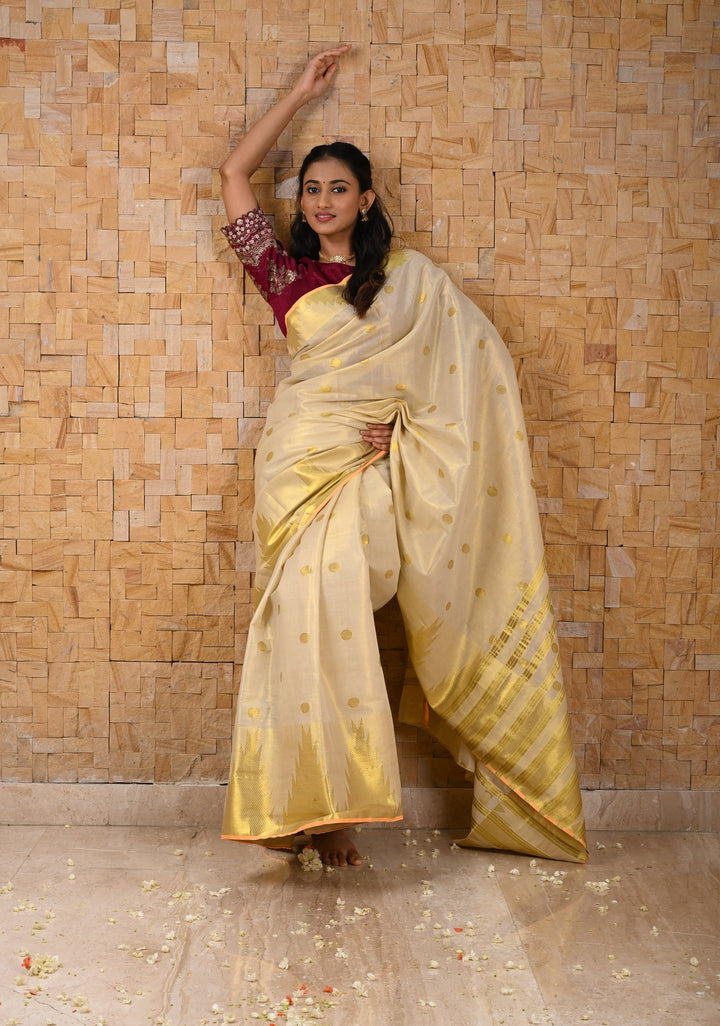 Beige Tissue Cotton Saree with Zari Coin Buttis And Temple Border