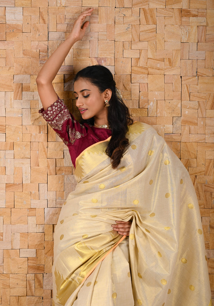 Beige Tissue Cotton Saree with Zari Coin Buttis And Temple Border
