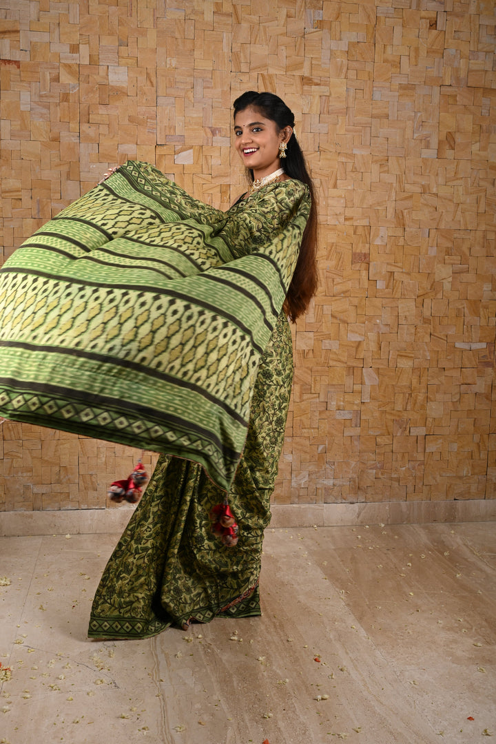 Vanaspati Hand Block Print on Modal Silk Saree in Moss Green with Kalamkari Border and Angoor latkans