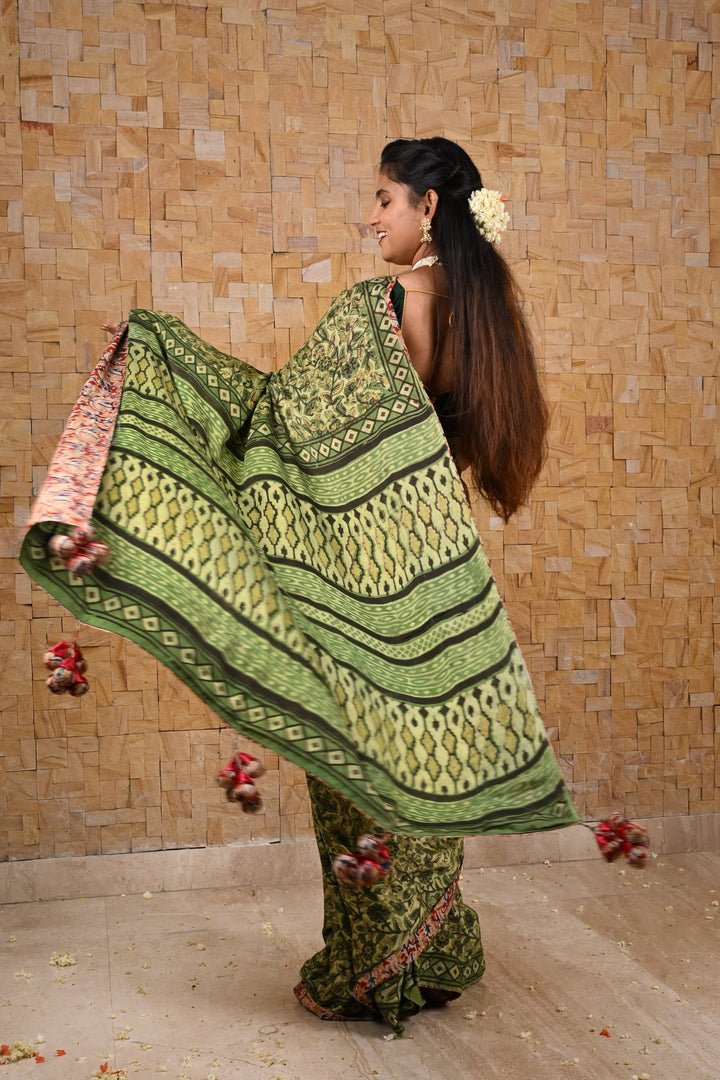 Vanaspati Hand Block Print on Modal Silk Saree in Moss Green with Kalamkari Border and Angoor latkans
