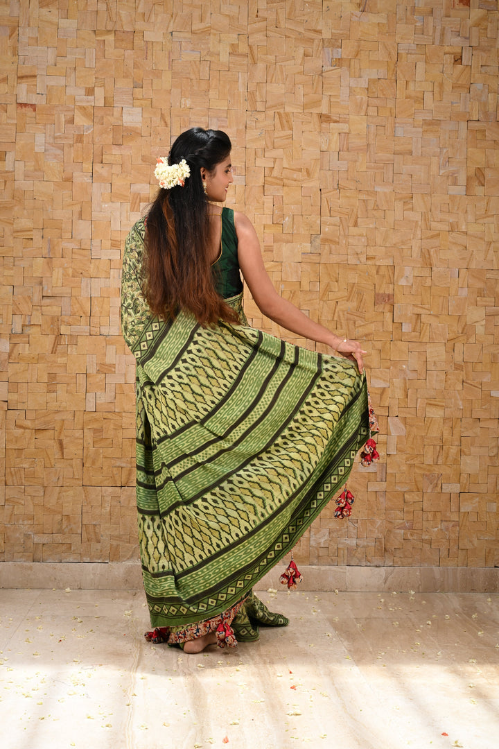 Vanaspati Hand Block Print on Modal Silk Saree in Moss Green with Kalamkari Border and Angoor latkans
