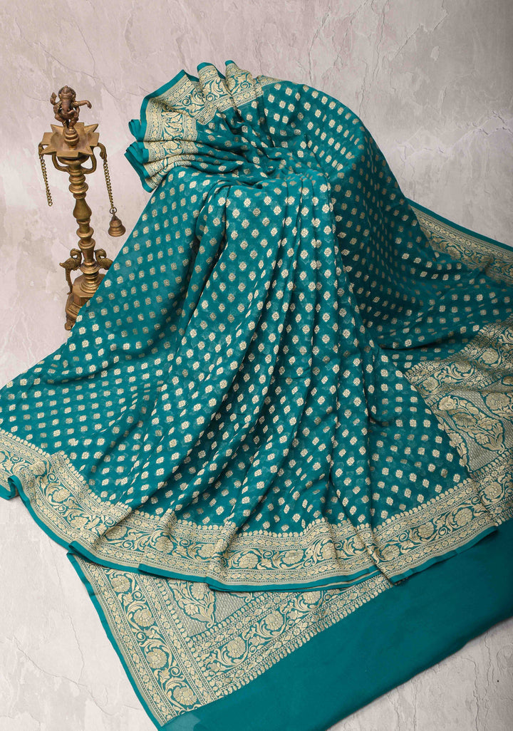 Authentic Banarasi Silk Georgette Saree in Dark Teal with Floral Butta and Zari Border | SILK MARK CERTIFIED