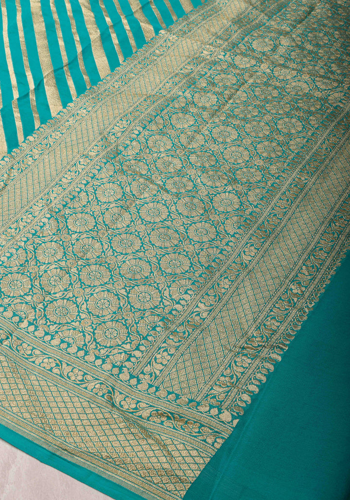 Exquisite Cyan Banarasi Georgette Silk Saree with Diagonal Zari Stripes and Zari Border | SILK MARK CERTIFIED