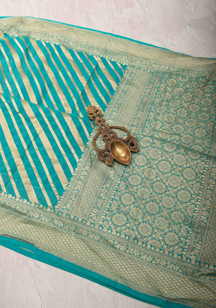 Exquisite Cyan Banarasi Georgette Silk Saree with Diagonal Zari Stripes and Zari Border | SILK MARK CERTIFIED