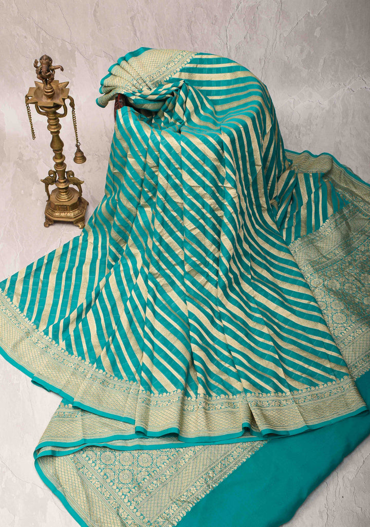 Exquisite Cyan Banarasi Georgette Silk Saree with Diagonal Zari Stripes and Zari Border | SILK MARK CERTIFIED