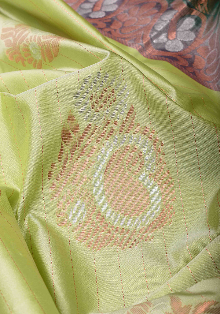 Tea Green Borderless Semi Silk Saree with Zari Stripes and Alfi Paisley Motifs