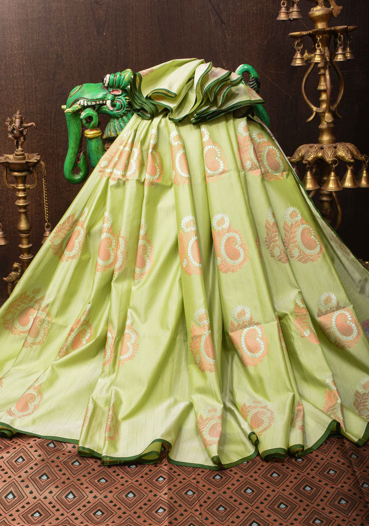 Tea Green Borderless Semi Silk Saree with Zari Stripes and Alfi Paisley Motifs