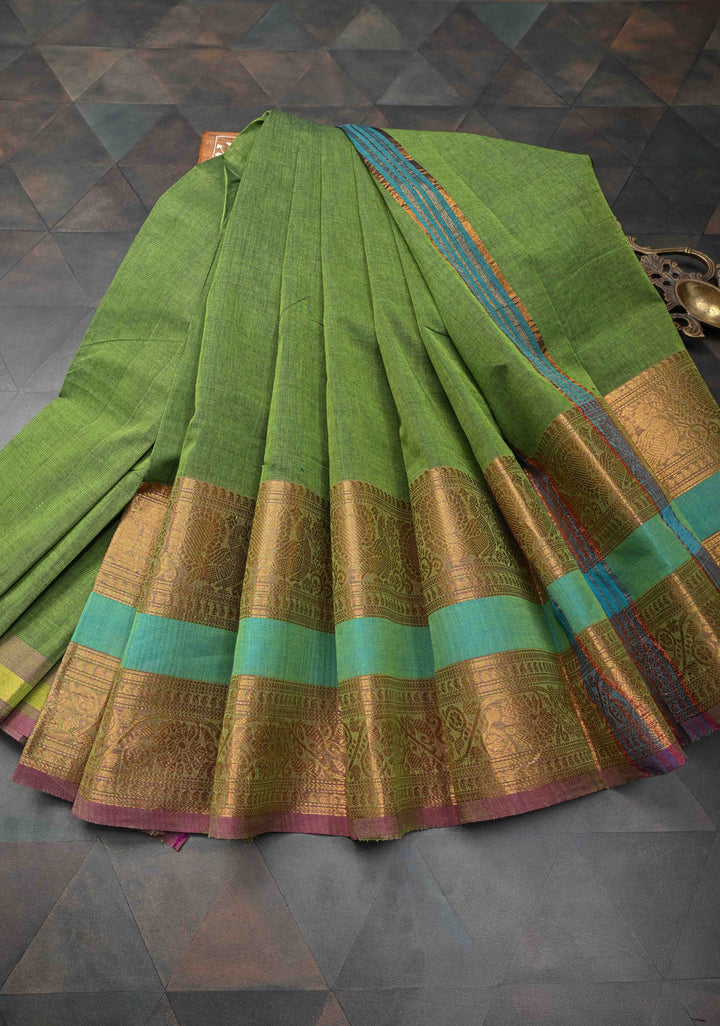 Oilve green Kanchi Cotton Saree with contrast zari border , No Blouse piece